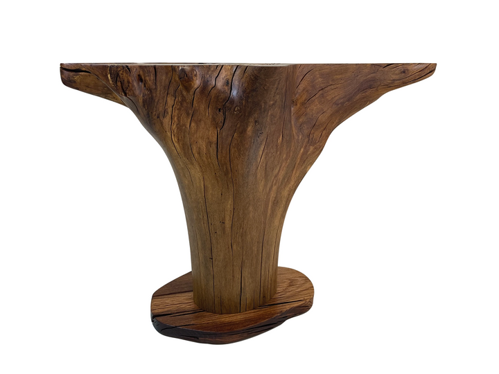 Front view of oak tree stump dining table with  a Tung oil finish.