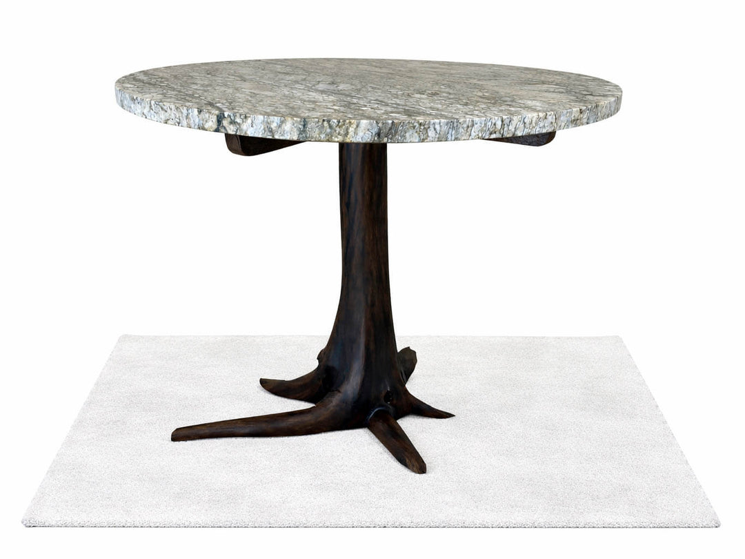 Front lower view of round granite top dining table on a black walnut tree stump base with white back ground