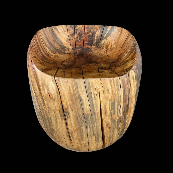 Front view of solid hand carved sycamore vanity chair with white background.