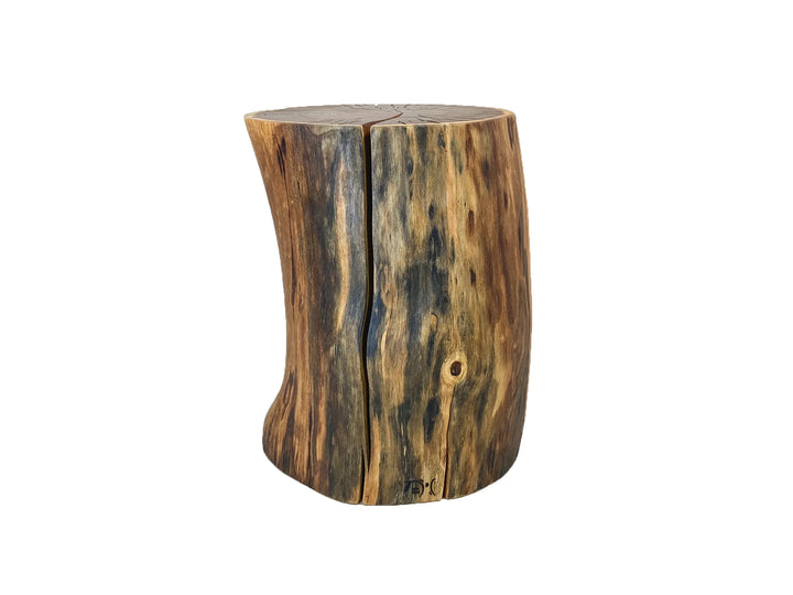 A rustic wooden side table made from a natural tree stump with a curved, sculptural shape, featuring prominent dark and light wood grain patterns, shown on a white background.