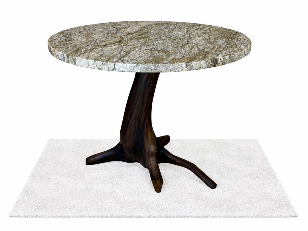 Side view of black walnut dining table with round granite top