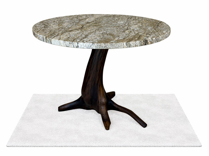 Side view of black walnut dining table with round granite top