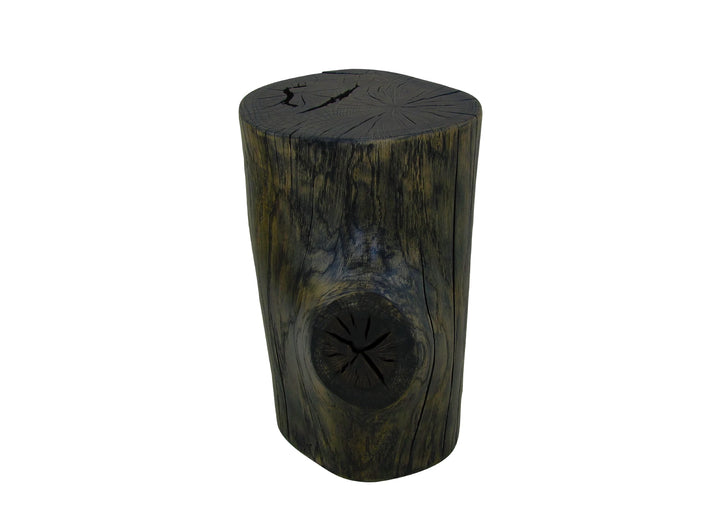 A rustic cylindrical oak log side table with a dark weathered finish, featuring a carved knot detail on the top surface, placed on a white background.