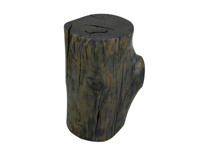 A rustic wood stump side table with a dark brown and black weathered finish on a white background.